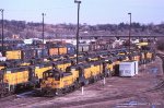Storage, and SO MUCH to see here. GP7s, GP30s Fs, cabooses, and freight cars with no graffiti. C&NW, yard, Des Moines, Iowa. January 13, 1983. 